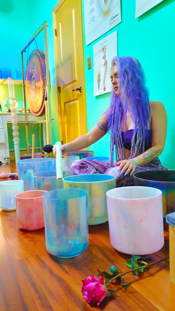 Sdar Lotus playing crystal singing bowls